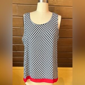 Red, white, and navy blue patterned sleeveless blouse with red detailing